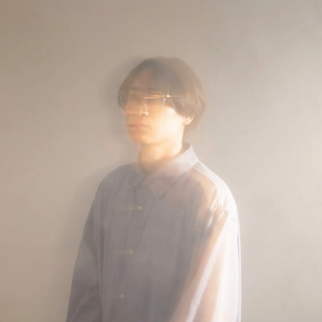 メガネをかけた田渕将吾氏のポートレート