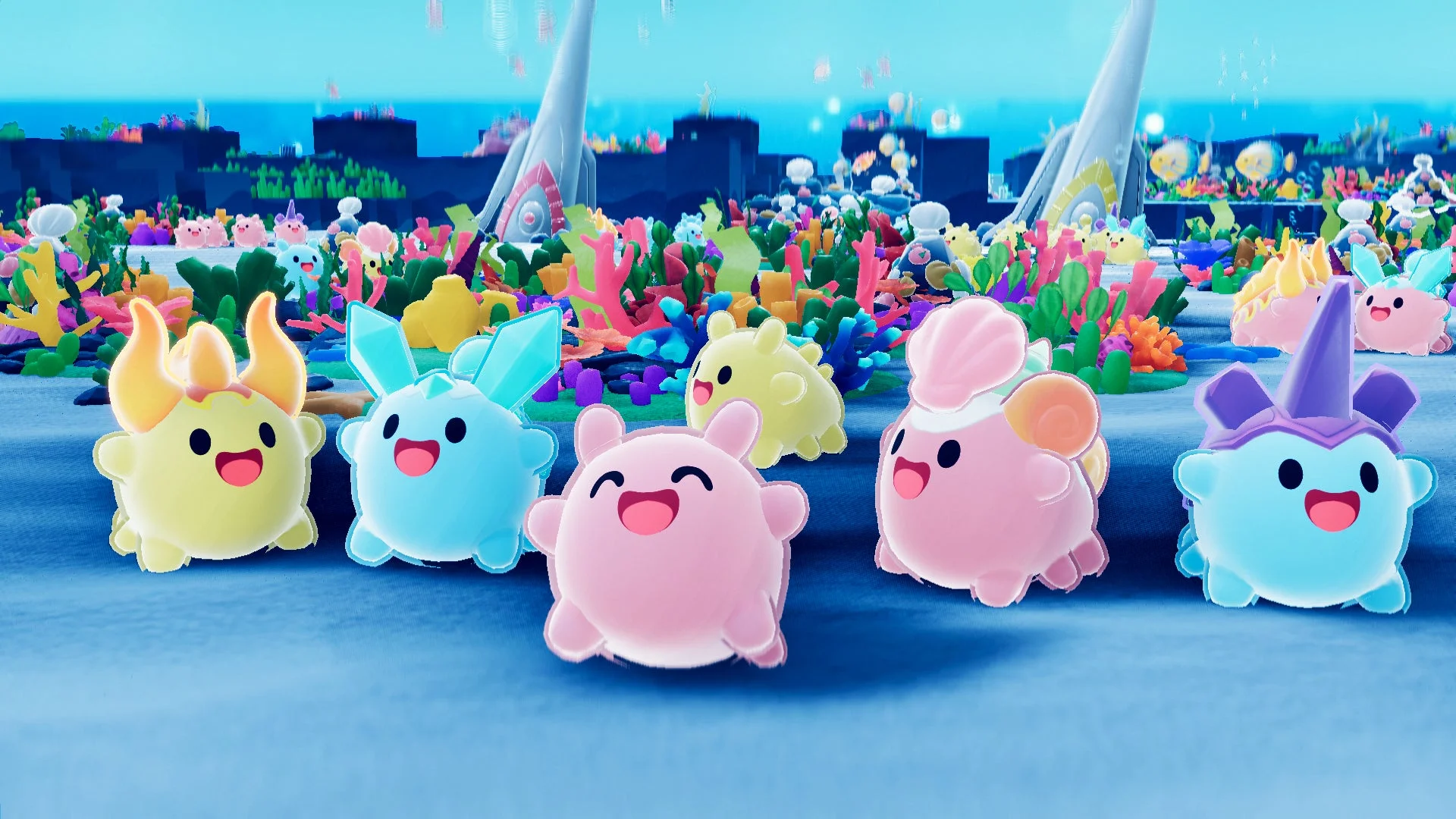 カラフルなサンゴ礁が広がる明るい海中世界で、様々な色と形をした愛らしいキャラクターたちが楽しそうに集まっています。背景には幻想的な建物も見え、ゲームやアニメのような雰囲気です。