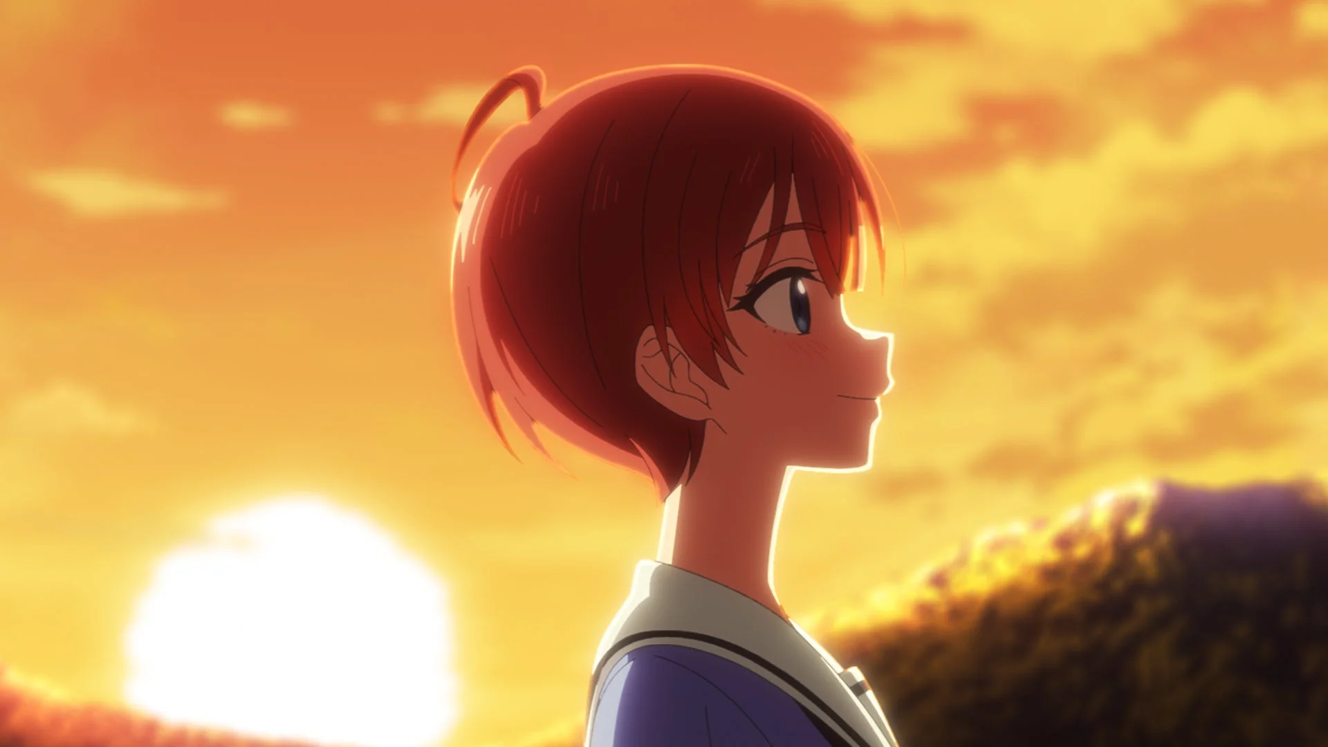 夕焼け空を見つめる少女