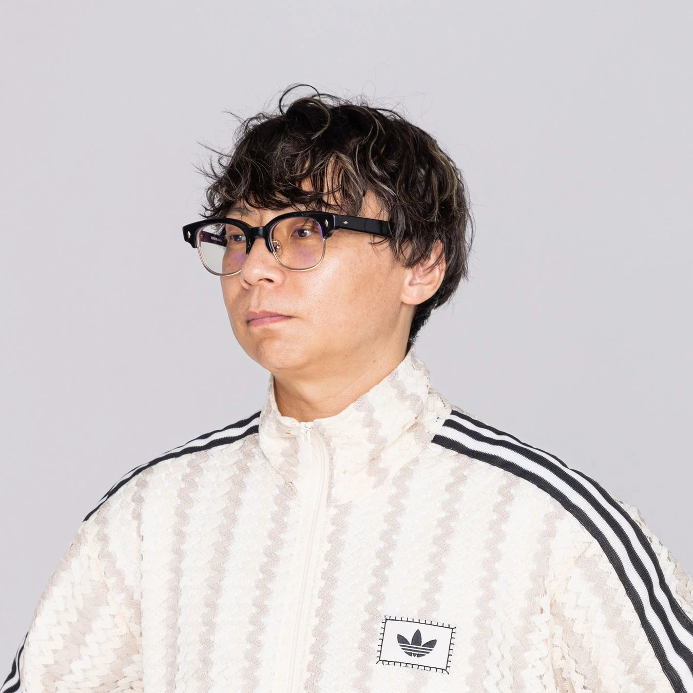 眼鏡をかけた和田篤司氏のポートレート