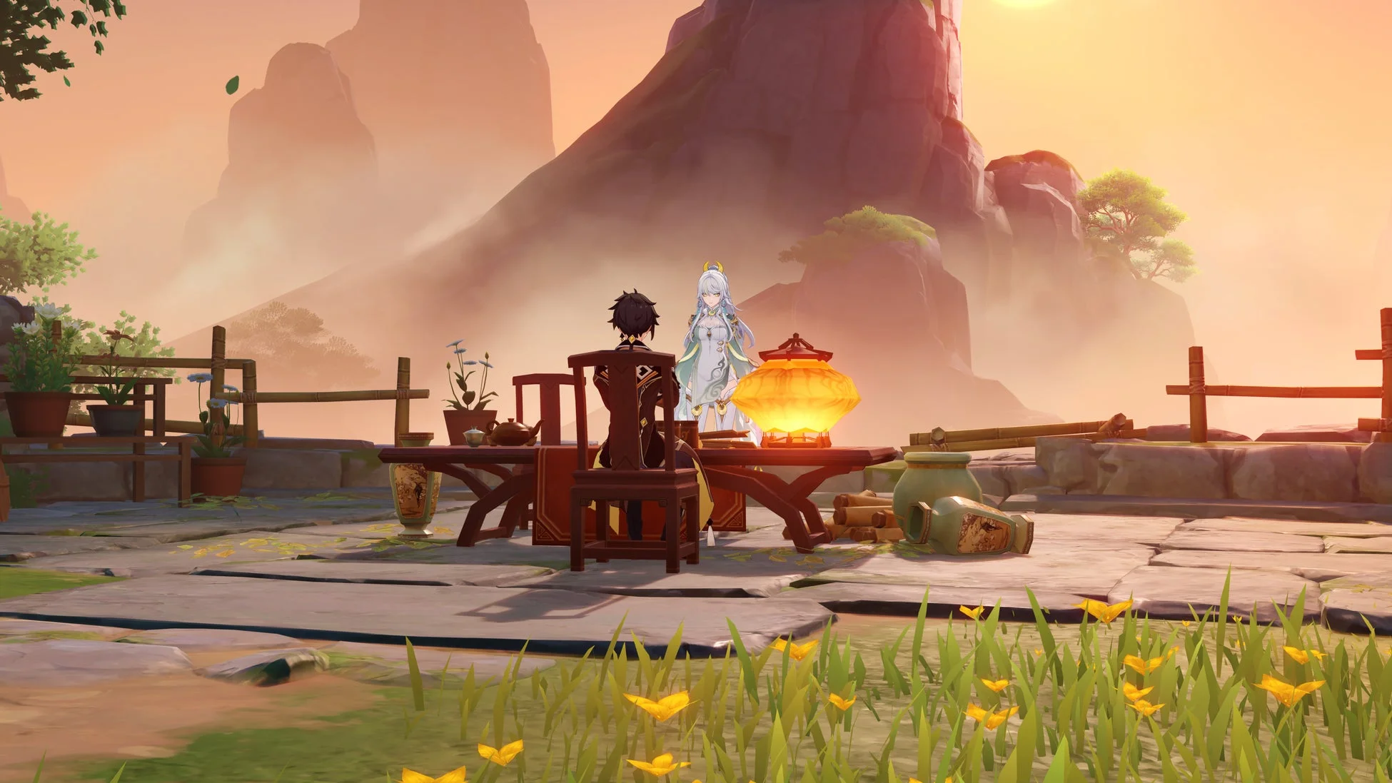 鍾離と申鶴が、夕焼けに染まる広大な山々を背景にしたテラスで、提灯の光が灯るテーブルを囲んでいる情景