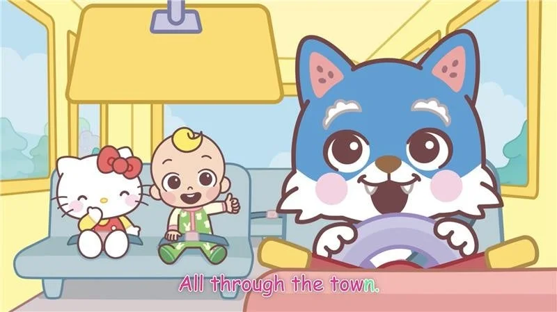 バスの中でハローキティと赤ちゃんが座っており、青いオオカミのようなキャラクターが運転しているアニメーションの一場面です。