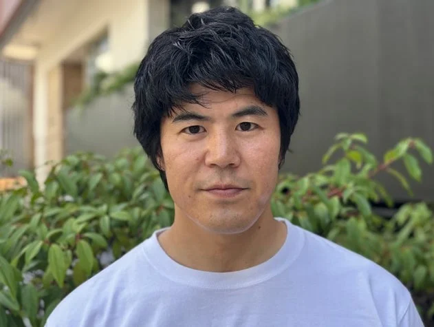 板橋駿谷さんのポートレート