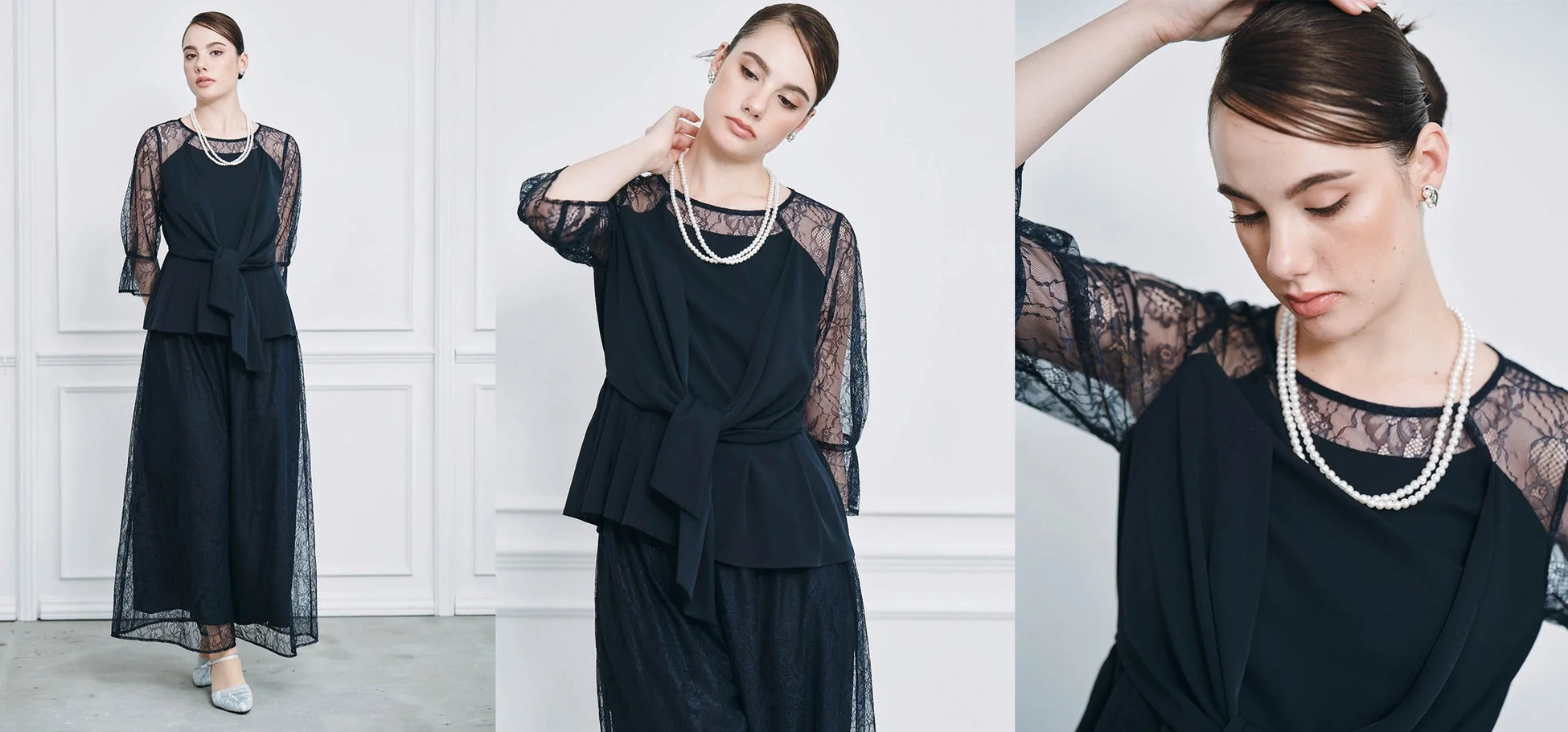 黒のレース素材の袖が特徴的なトップスとワイドパンツのセットアップを着用した女性の全身像です。パールのネックレスとイヤリングを合わせたエレガントなフォーマルスタイルで、上品な雰囲気を演出しています。