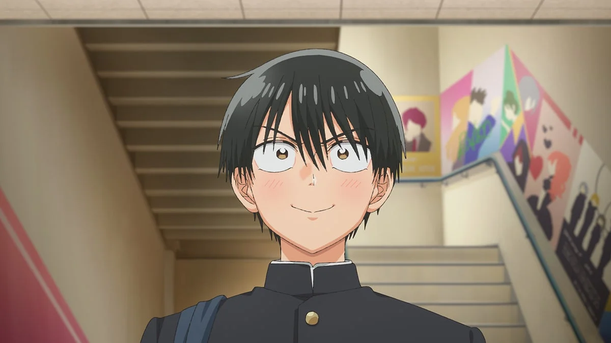 照れ笑いする男子学生