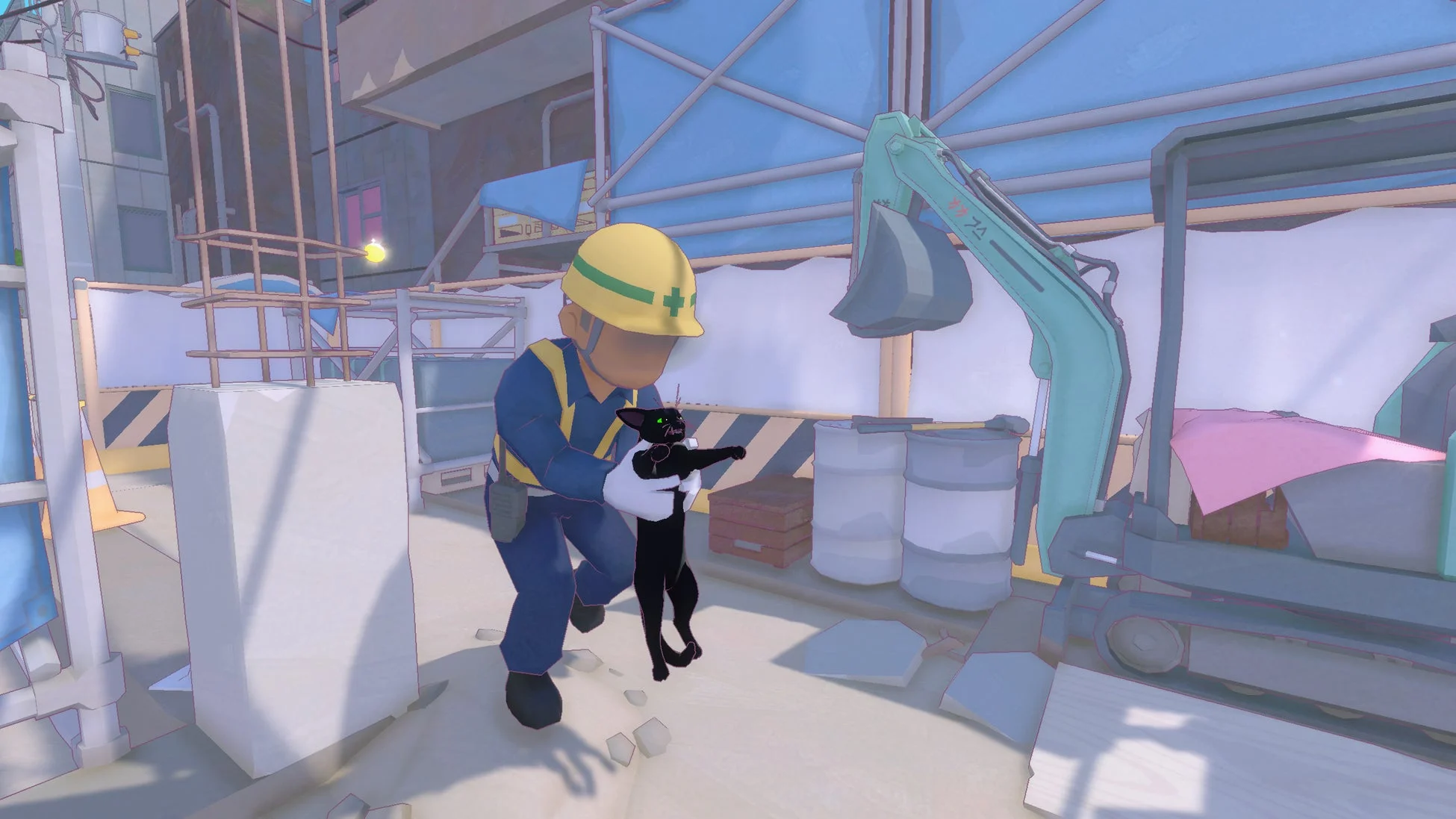 作業員に抱えられる黒猫