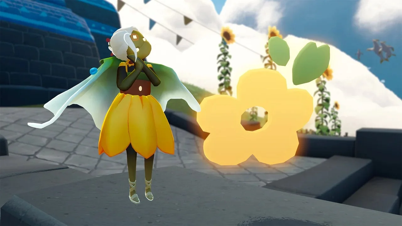 黄色の花びらのようなドレスと緑のケープをまとったキャラクター