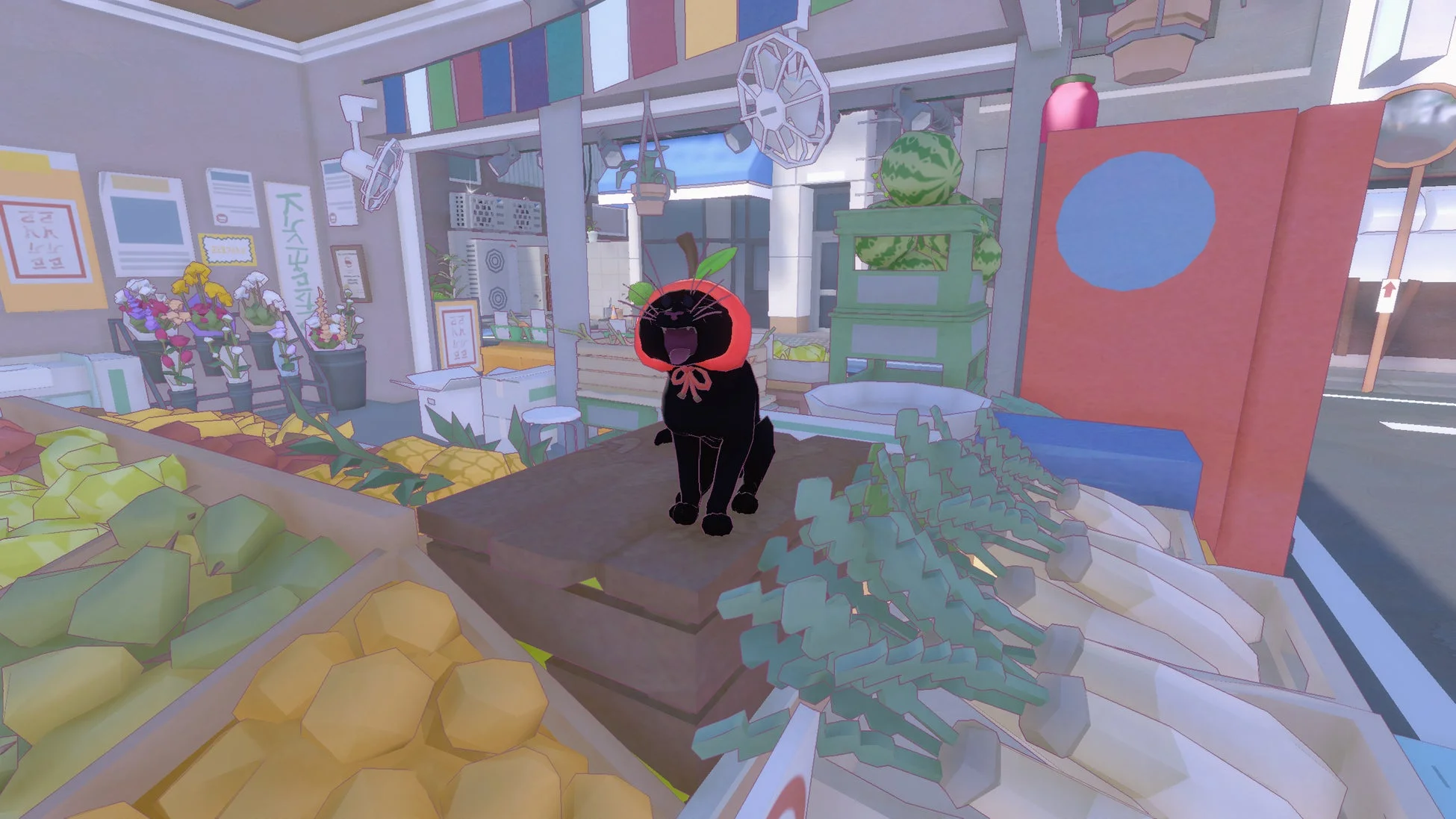 大きくあくびをする黒猫