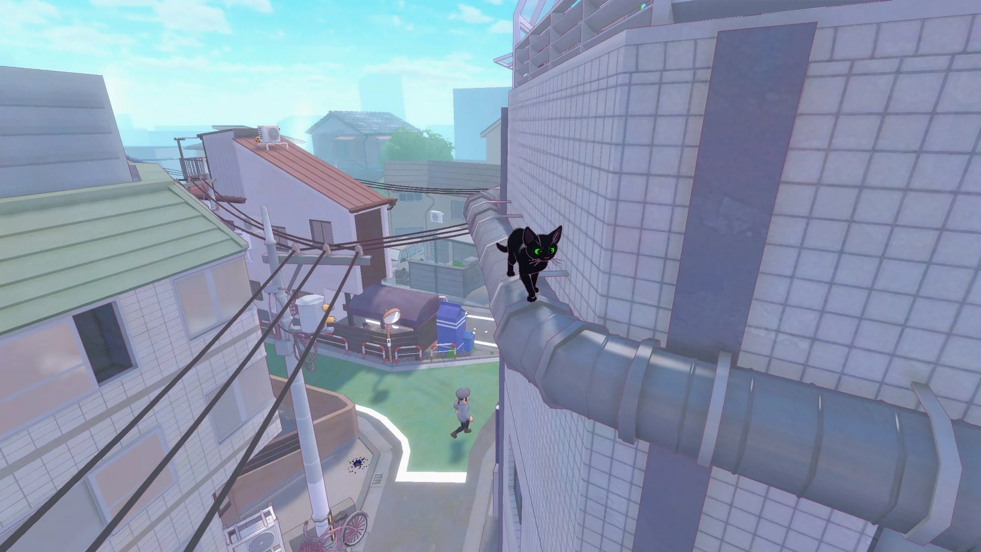 建物のパイプの上を歩く黒猫