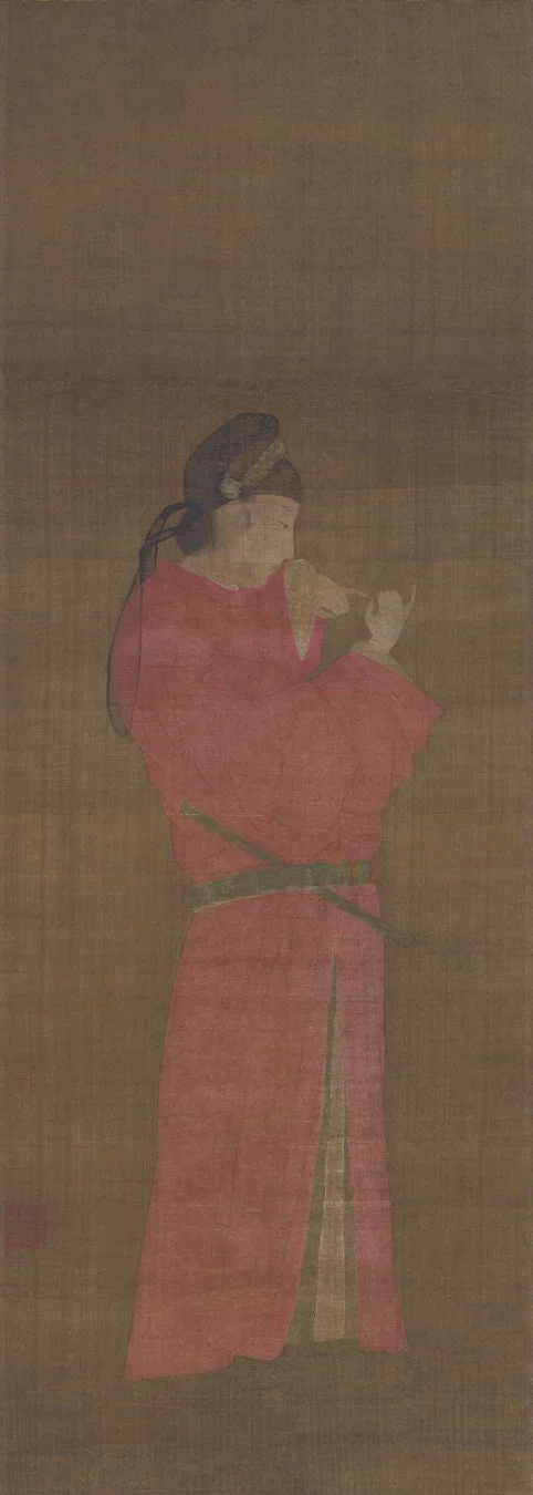 伝統的な衣装の女性の人物画