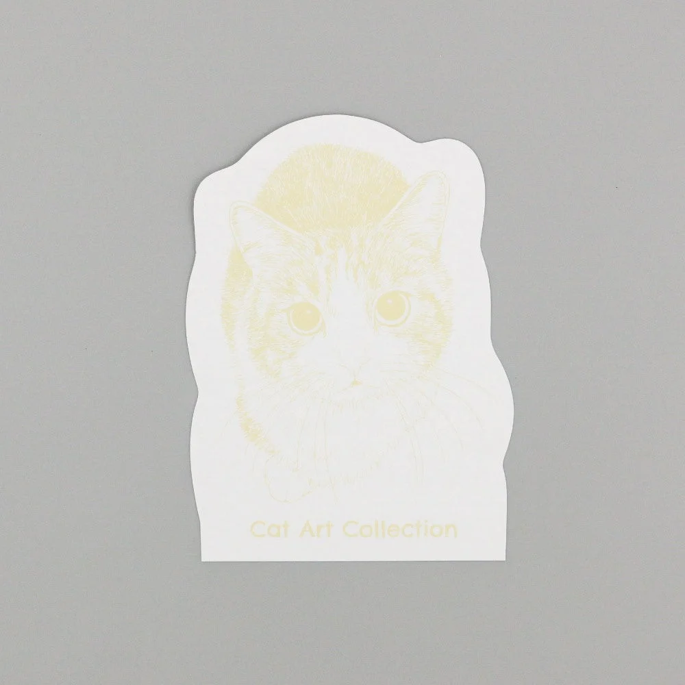 淡い黄色の線画で描かれた猫の顔のイラスト