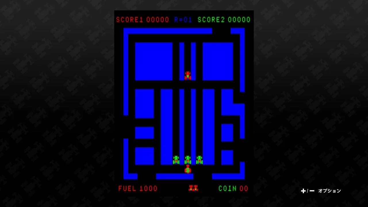 青い迷路状のフィールドで車を操作するレトロなビデオゲームの画面