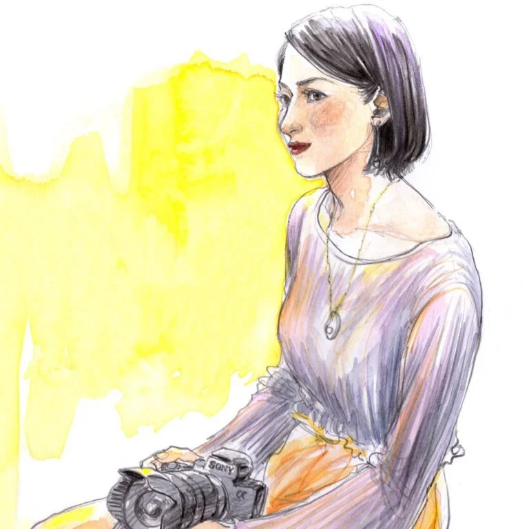 カメラを持つ女性のイラスト