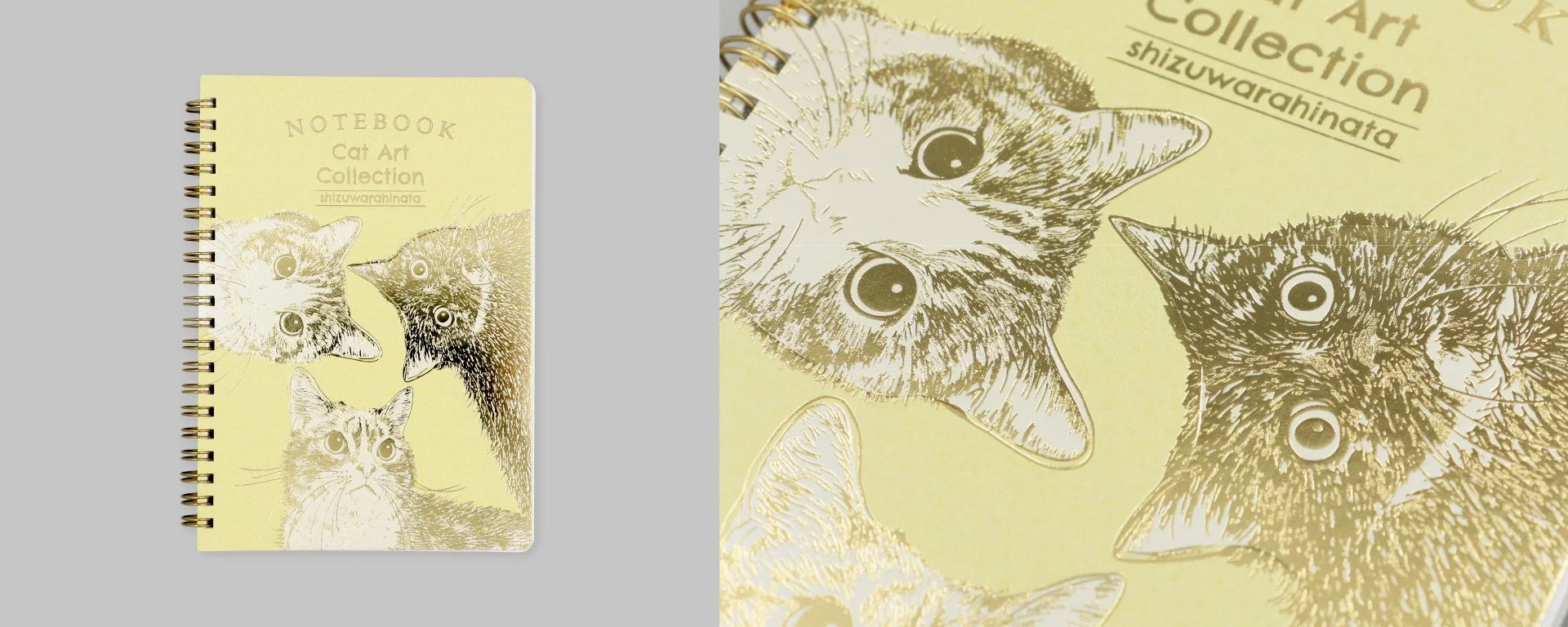 淡い黄色のスパイラルノートの表紙に金色で描かれた3匹の猫の顔