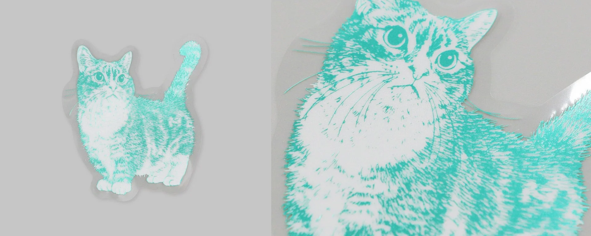 アクアと白の二色で描かれた可愛らしい猫のイラスト