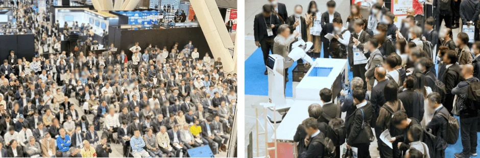 大規模な屋内イベントの様子。多くの参加者が講演を聴講し、ロボットアームのデモンストレーションを見学している。