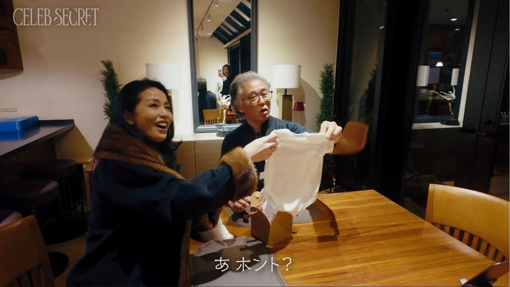 ベビー服でサプライズ