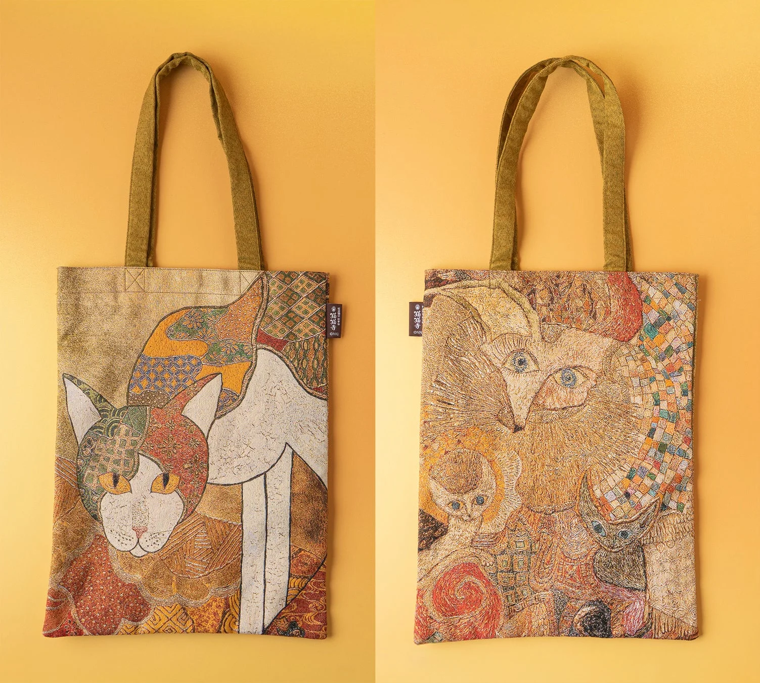 猫のアートが描かれた横型トートバッグ