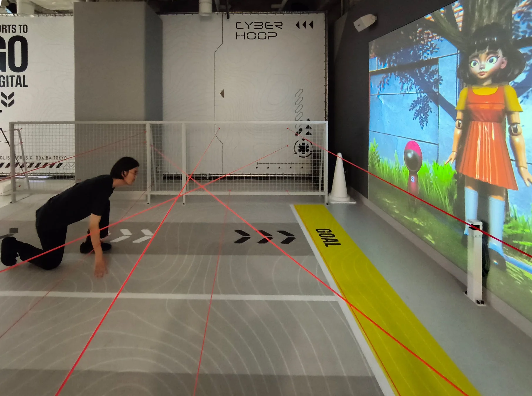 レーザーラインをくぐり抜けるゲームの様子
