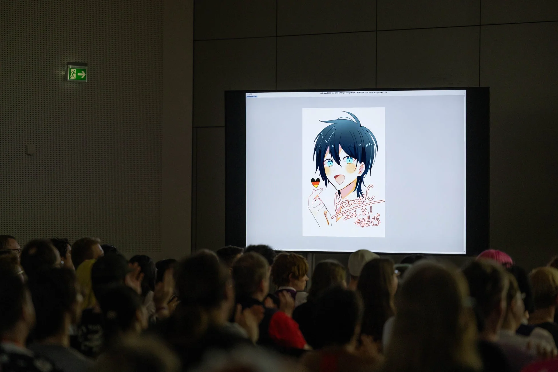 イベント会場のスクリーンに映し出されたイラスト